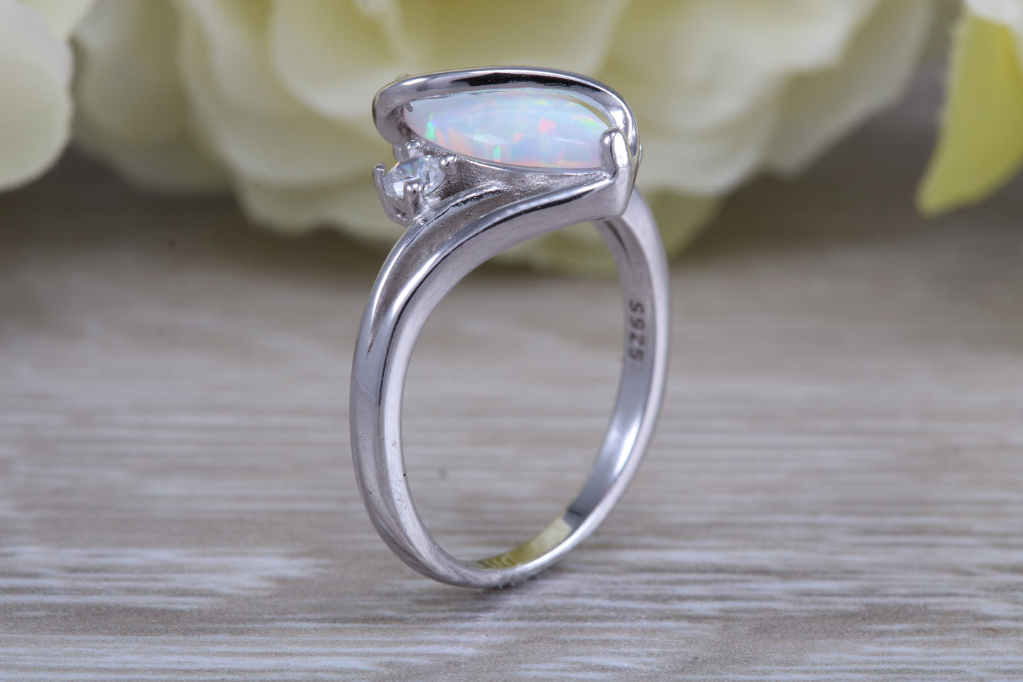 Very sparkly and fiery Opal and cubic zirconia set dress ring, solid sterling silver ring further rhodium plated for that platinum look