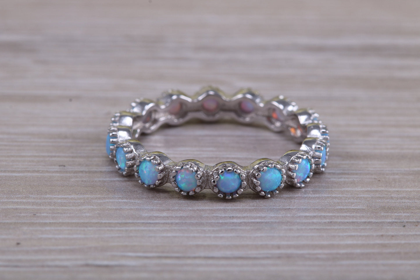 Very sparkly and fiery Opal full circle set ring, solid sterling silver ring further rhodium plated for that platinum look