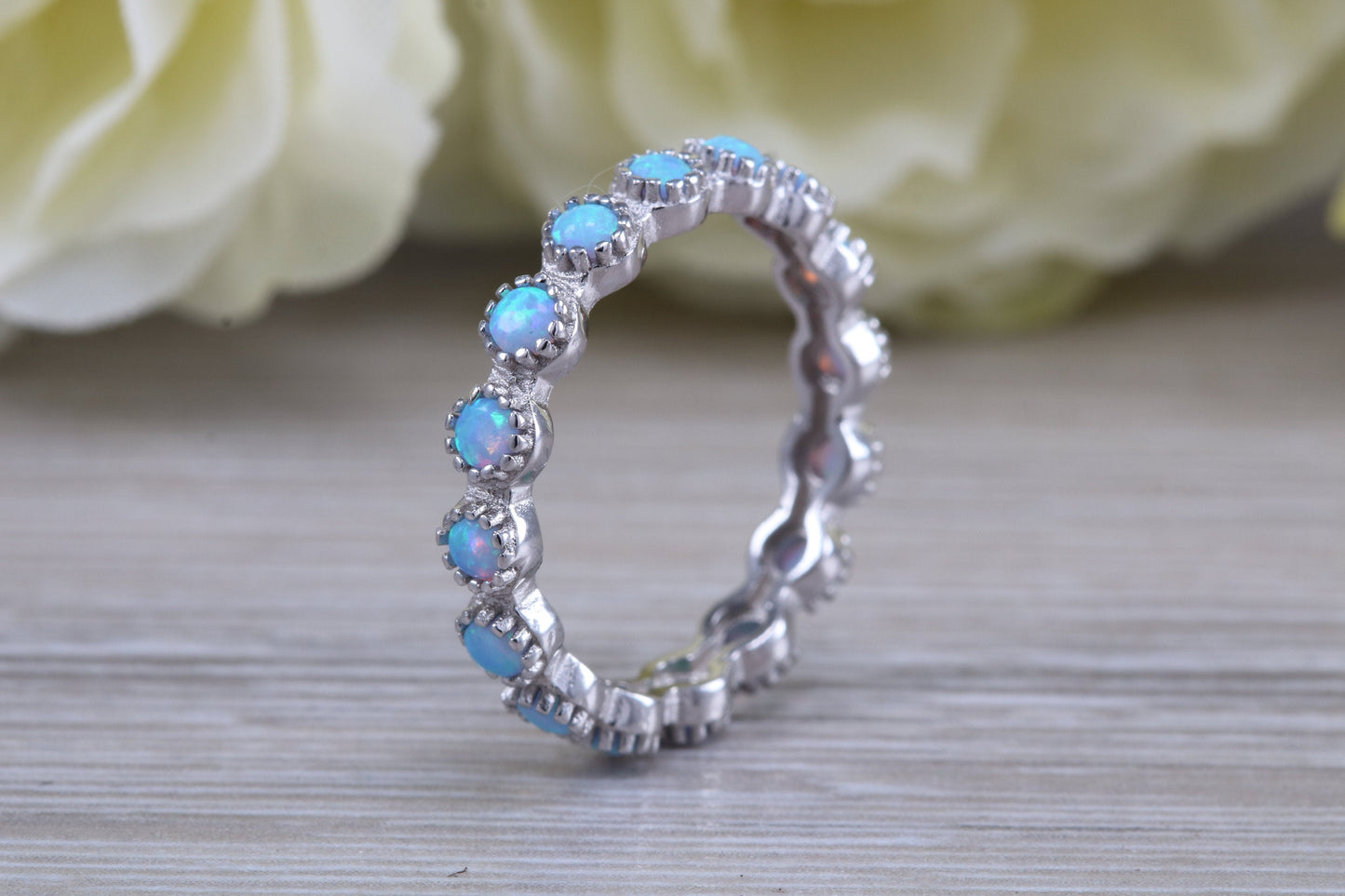 Very sparkly and fiery Opal full circle set ring, solid sterling silver ring further rhodium plated for that platinum look