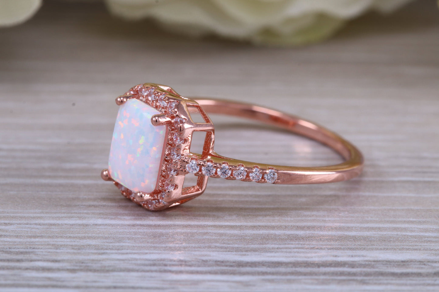 Very sparkly and fiery Opal and cubic zirconia set dress ring, solid sterling silver ring further 18ct rose gold plated