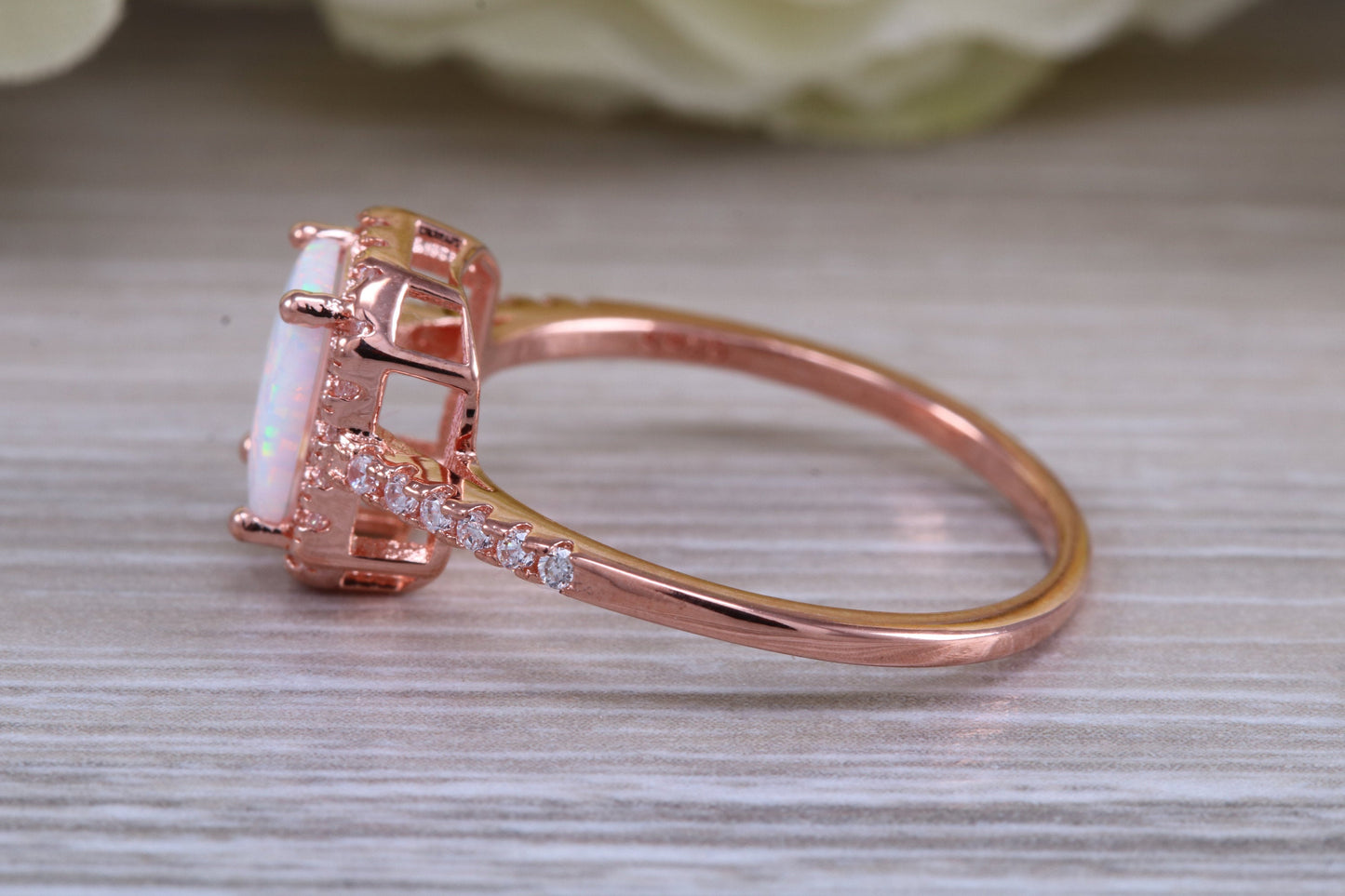 Very sparkly and fiery Opal and cubic zirconia set dress ring, solid sterling silver ring further 18ct rose gold plated