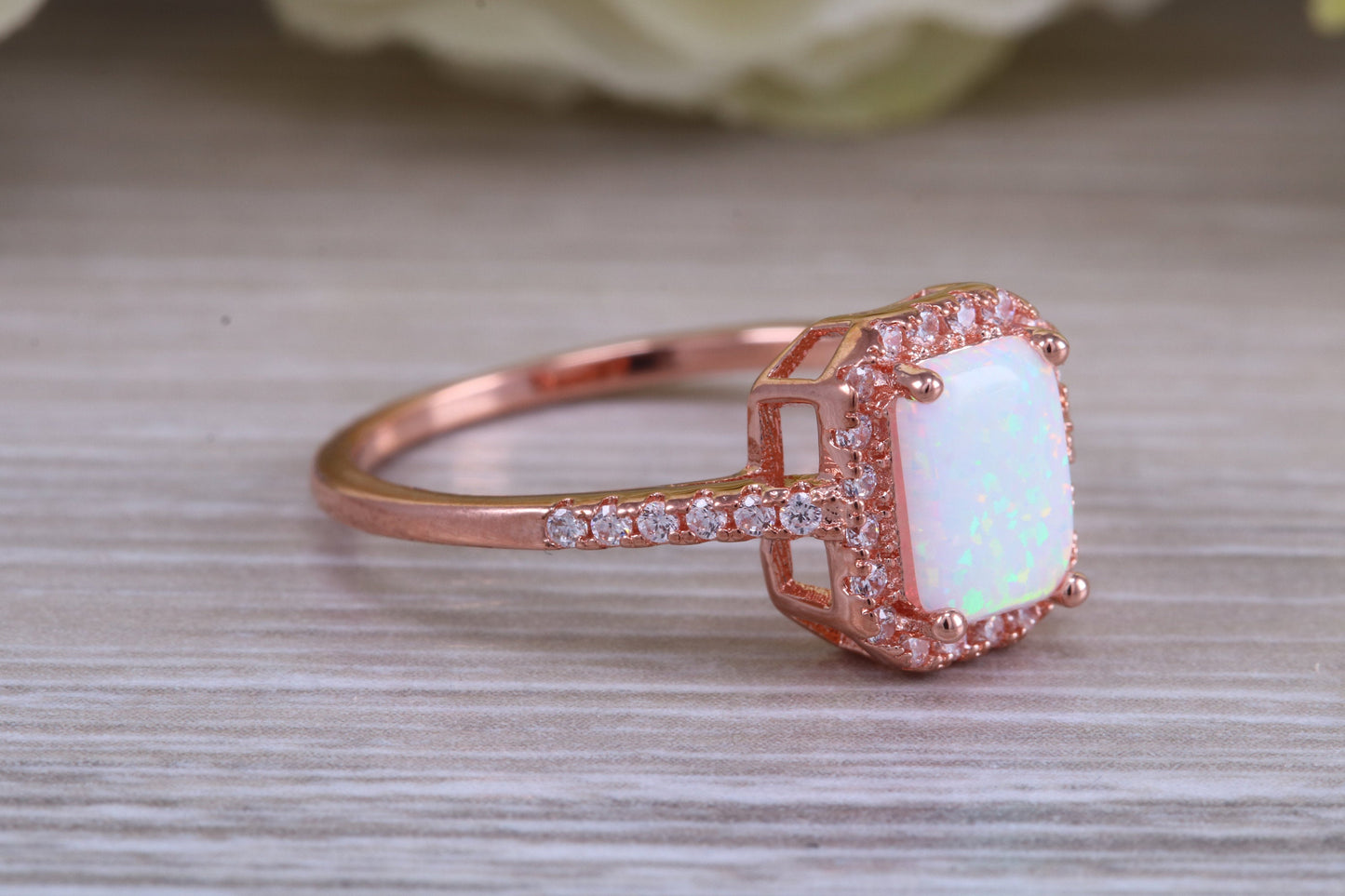 Very sparkly and fiery Opal and cubic zirconia set dress ring, solid sterling silver ring further 18ct rose gold plated