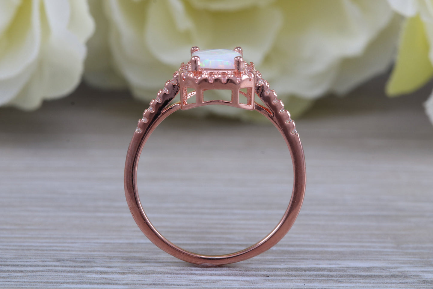 Very sparkly and fiery Opal and cubic zirconia set dress ring, solid sterling silver ring further 18ct rose gold plated