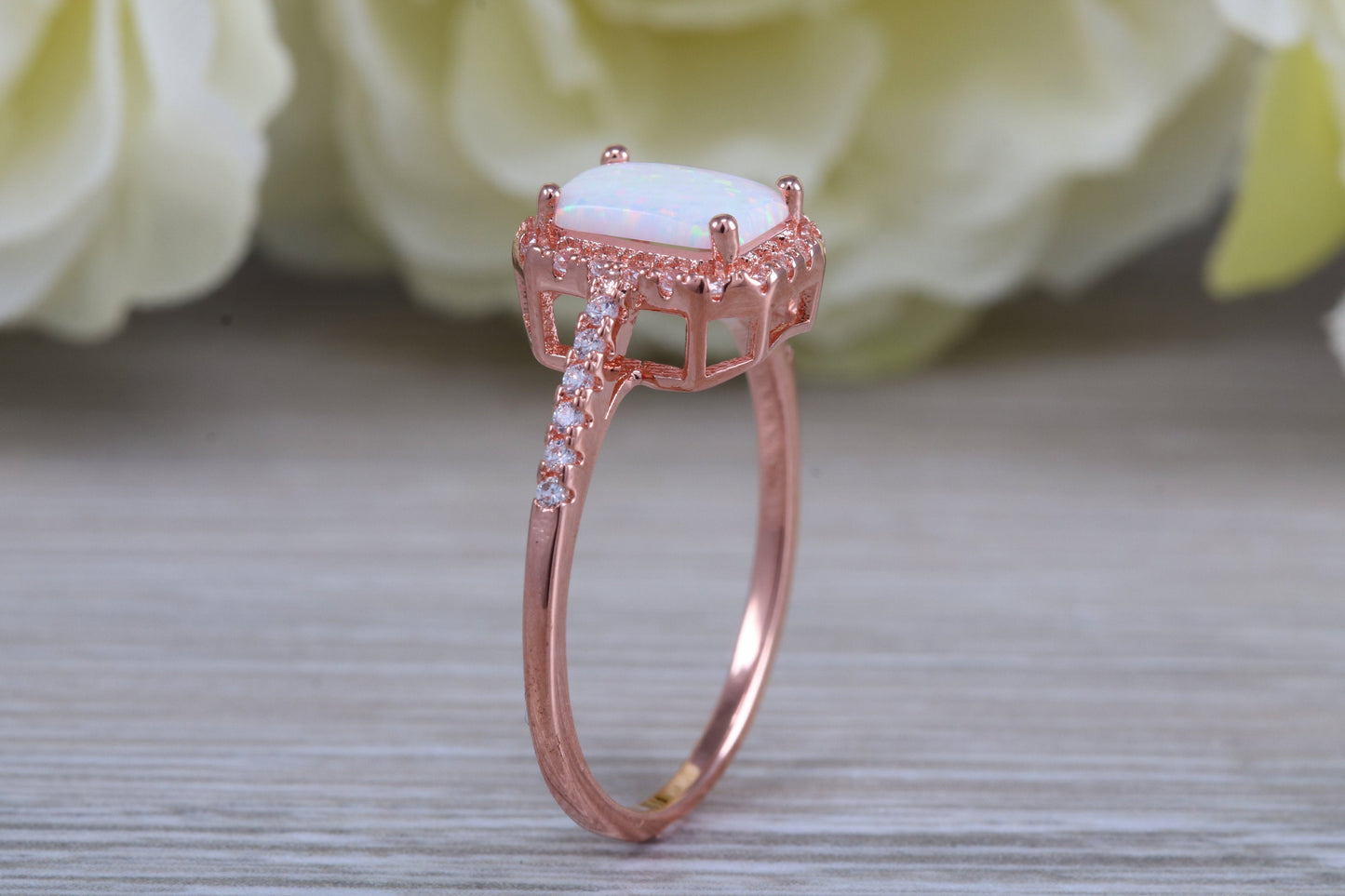 Very sparkly and fiery Opal and cubic zirconia set dress ring, solid sterling silver ring further 18ct rose gold plated