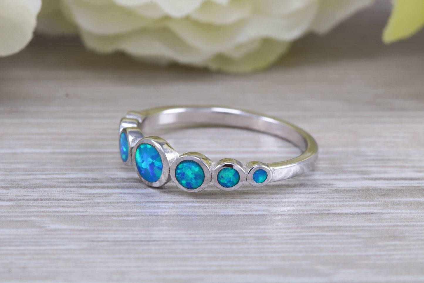 Fiery Blue Opal set bubble ring, solid sterling silver ring further rhodium plated for that platinum look