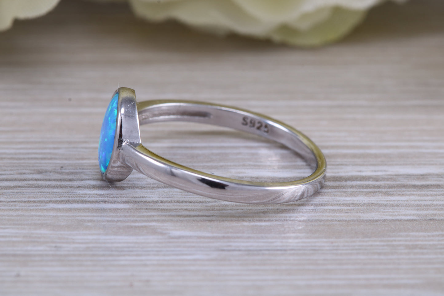 Fiery Blue Opal solitaire ring, solid sterling silver ring further rhodium plated for that platinum look