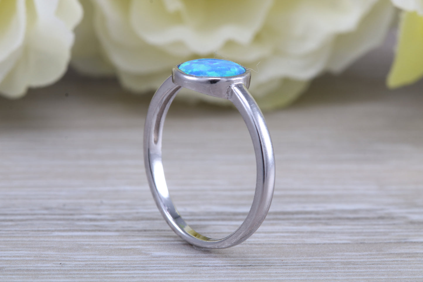 Fiery Blue Opal solitaire ring, solid sterling silver ring further rhodium plated for that platinum look
