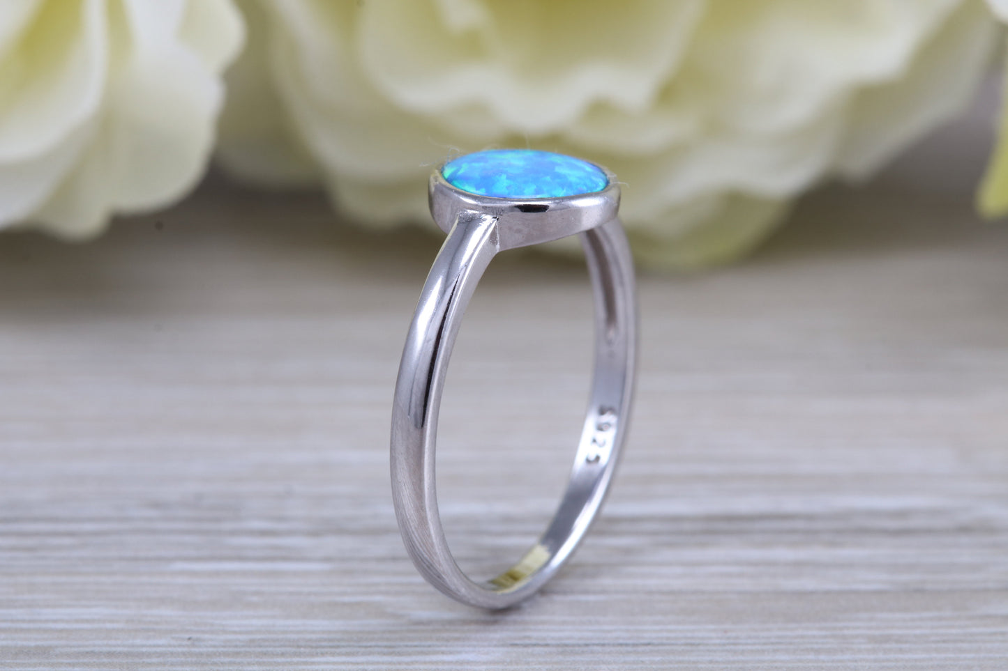 Fiery Blue Opal solitaire ring, solid sterling silver ring further rhodium plated for that platinum look