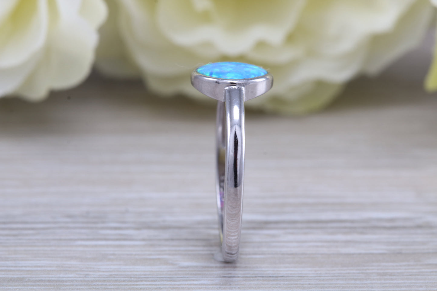 Fiery Blue Opal solitaire ring, solid sterling silver ring further rhodium plated for that platinum look