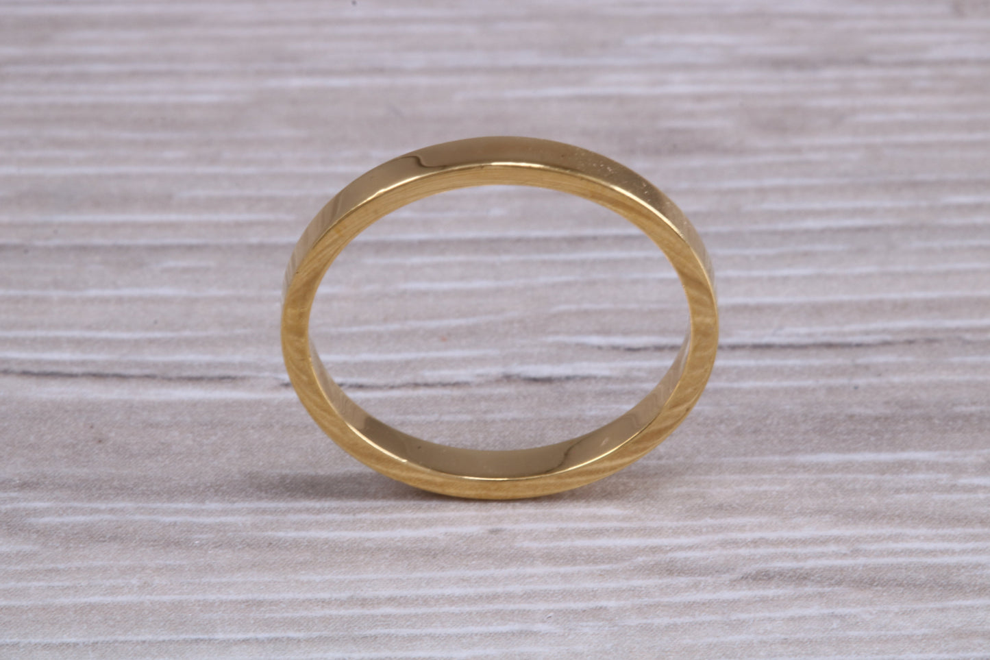 2 mm flat profile Silver band with 18ct yellow Gold hard plating, looks just like a gold band for a fraction of the cost