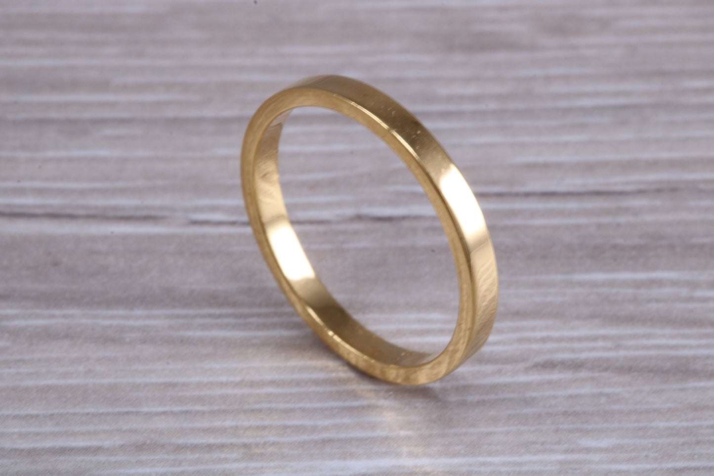 2 mm flat profile Silver band with 18ct yellow Gold hard plating, looks just like a gold band for a fraction of the cost