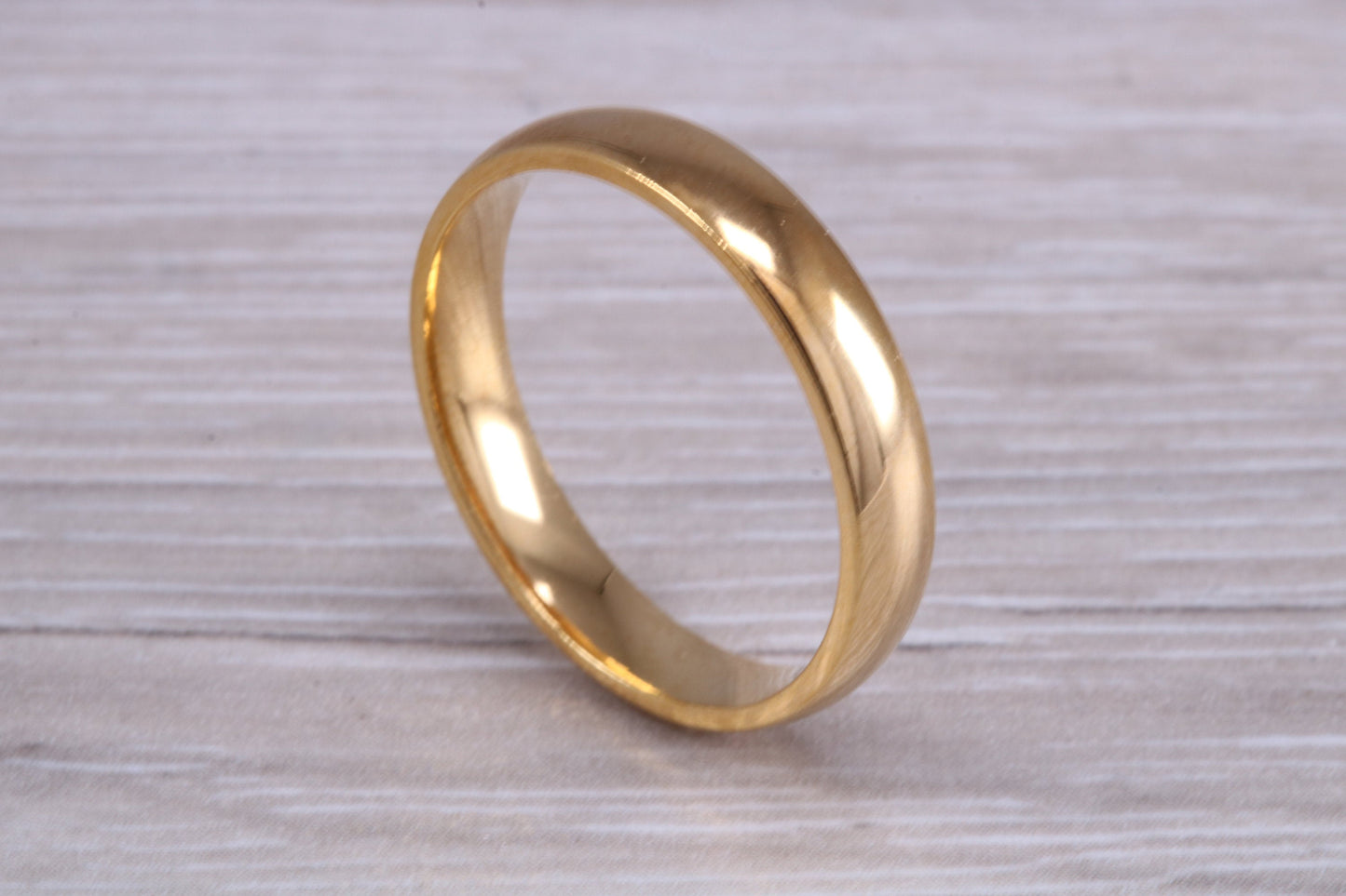 4 mm court profile Silver band with 18ct yellow Gold hard plating, looks just like a gold band for a fraction of the cost