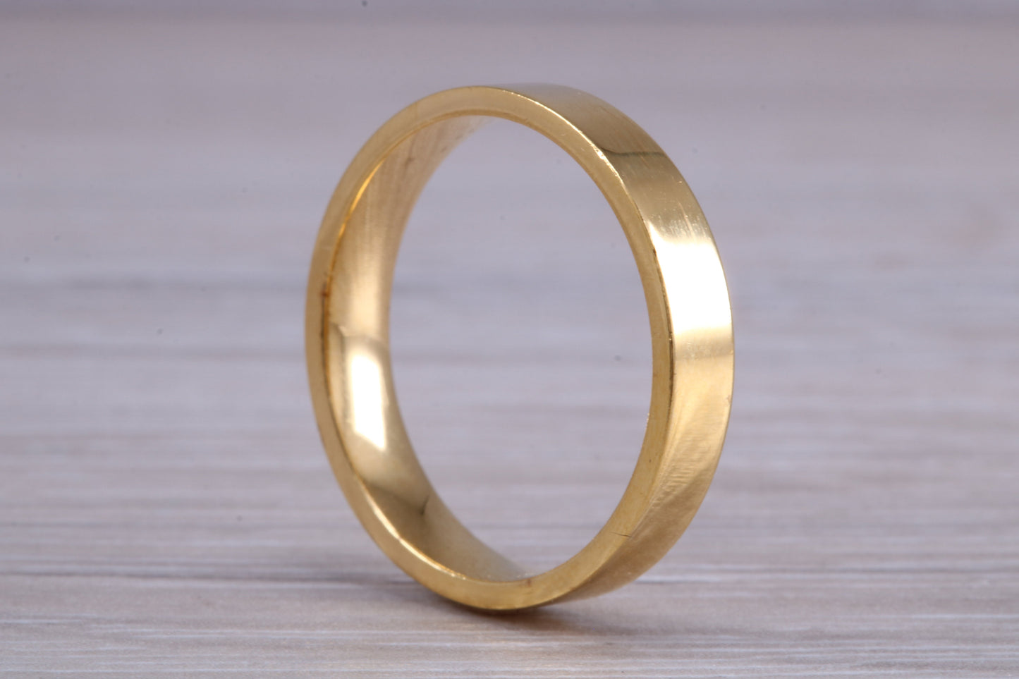 4 mm flat profile Silver band with 18ct yellow Gold hard plating, looks just like a gold band for a fraction of the cost
