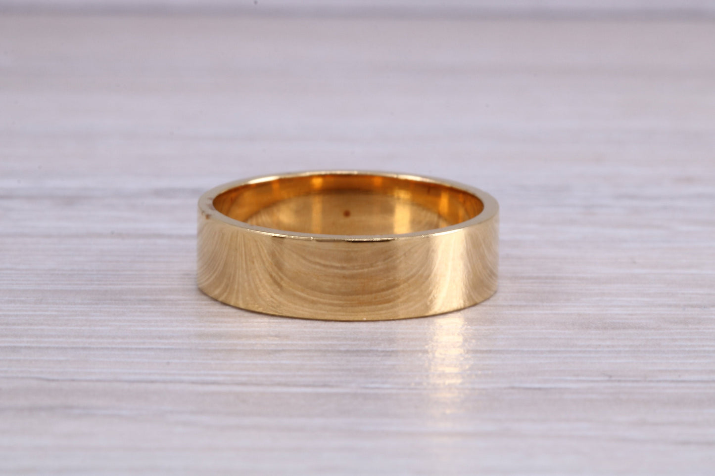 6 mm flat profile Silver band with 18ct yellow Gold hard plating, looks just like a gold band for a fraction of the cost