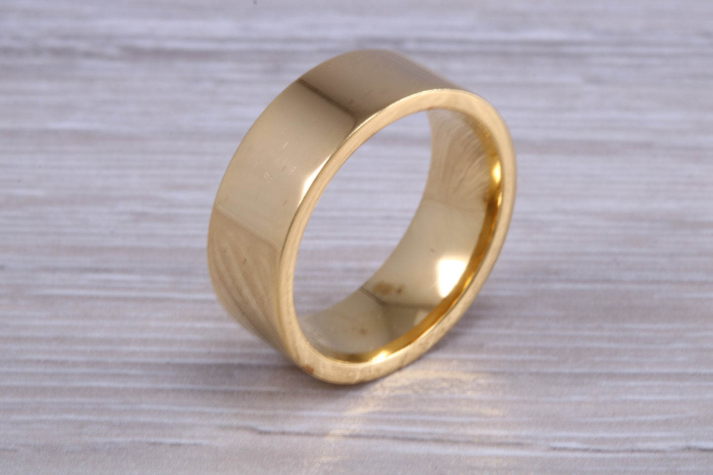 10 mm flat profile Silver band with 18ct yellow Gold hard plating, looks just like a gold band for a fraction of the cost. Very wide band