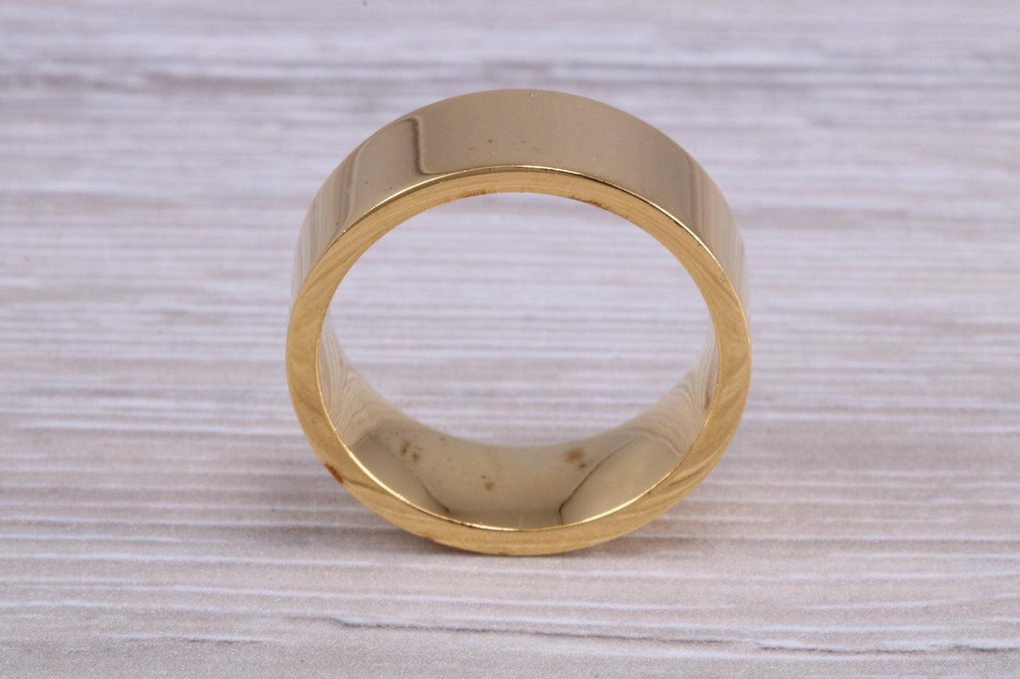 8 mm flat profile Silver band with 18ct yellow Gold hard plating, looks just like a gold band for a fraction of the cost. Very wide band