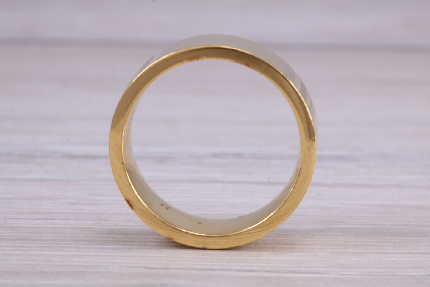 8 mm flat profile Silver band with 18ct yellow Gold hard plating, looks just like a gold band for a fraction of the cost. Very wide band