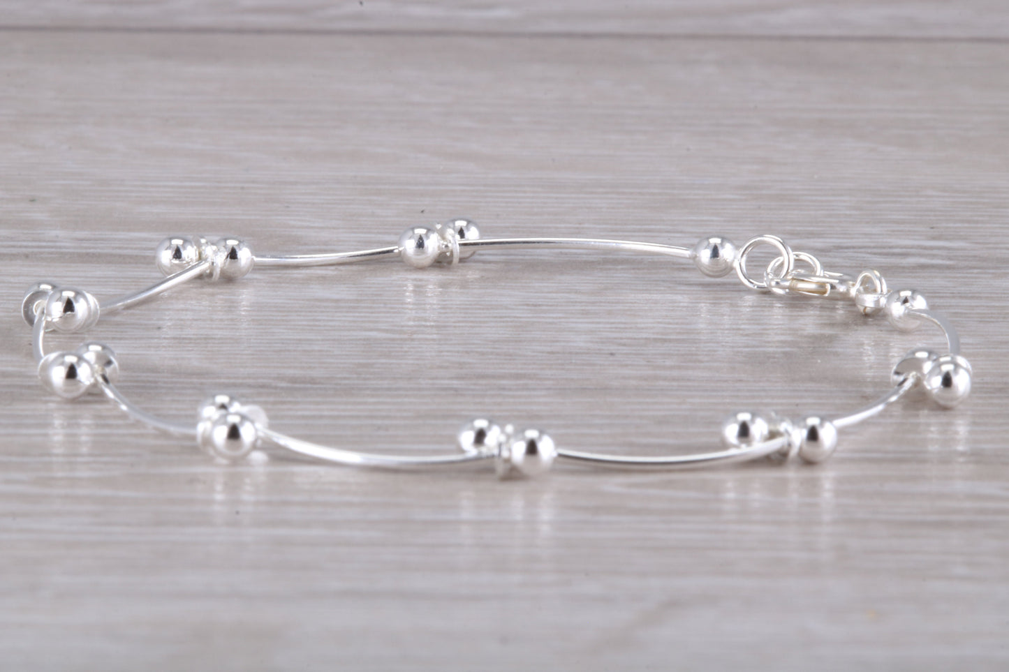 Ladies Wavy link silver bracelet, very smooth lines with hinged links and beautifully finished with a high polish, perfect gift solution