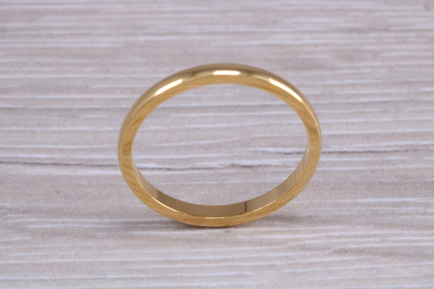 2 mm court profile Silver band with 18ct yellow Gold hard plating, looks just like a gold band for a fraction of the cost