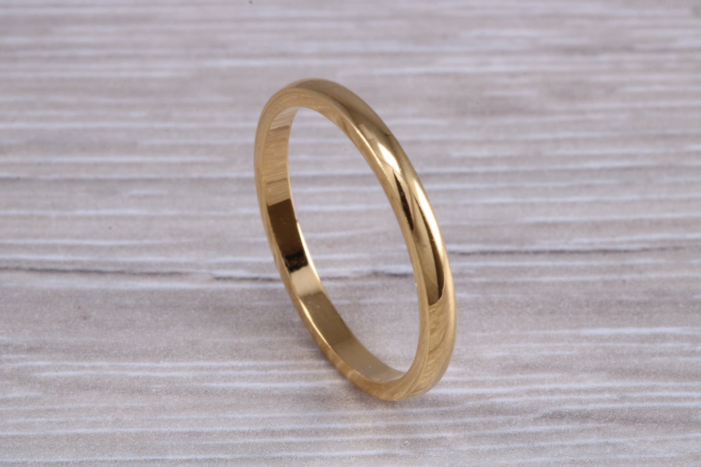 2 mm court profile Silver band with 18ct yellow Gold hard plating, looks just like a gold band for a fraction of the cost