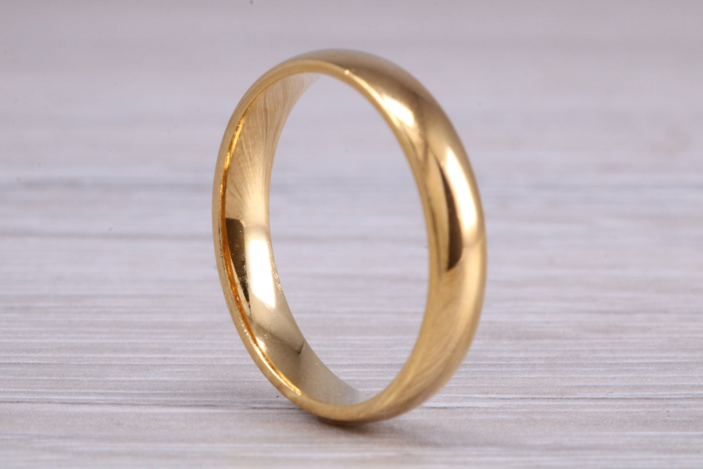 5 mm court profile Silver band with 18ct yellow Gold hard plating, looks just like a gold band for a fraction of the cost