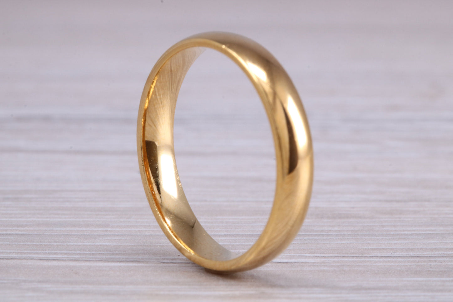 4 mm court profile Silver band with 18ct yellow Gold hard plating, looks just like a gold band for a fraction of the cost