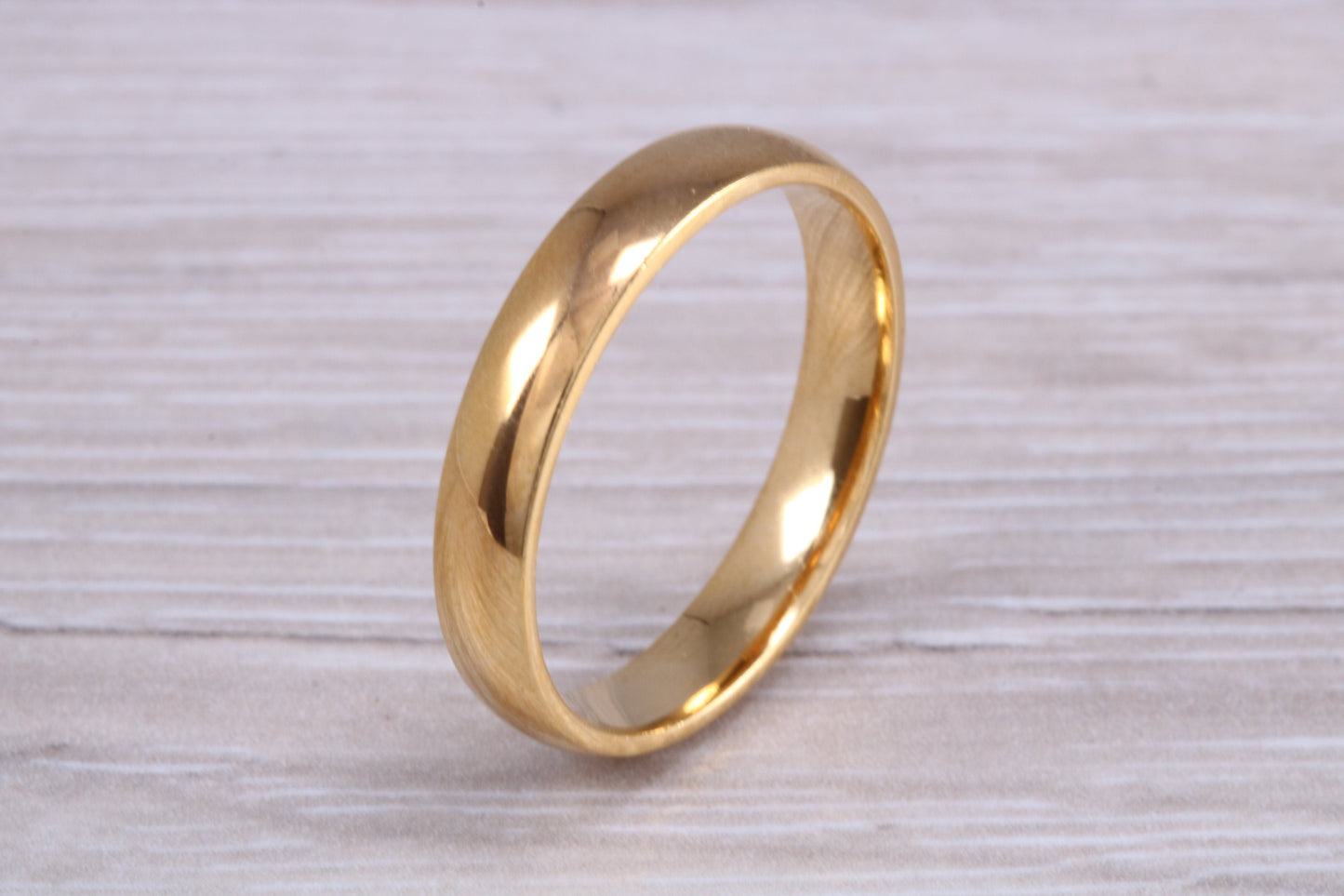 4 mm court profile Silver band with 18ct yellow Gold hard plating, looks just like a gold band for a fraction of the cost