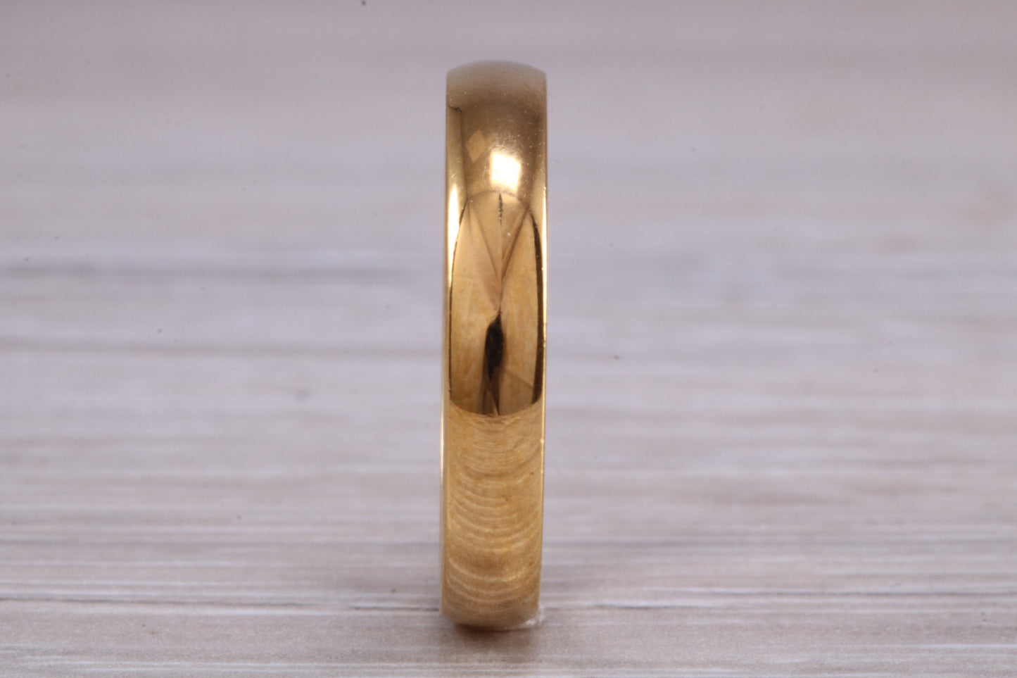 4 mm court profile Silver band with 18ct yellow Gold hard plating, looks just like a gold band for a fraction of the cost
