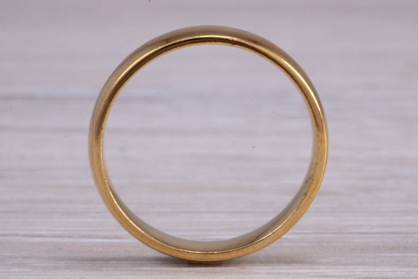 4 mm court profile Silver band with 18ct yellow Gold hard plating, looks just like a gold band for a fraction of the cost