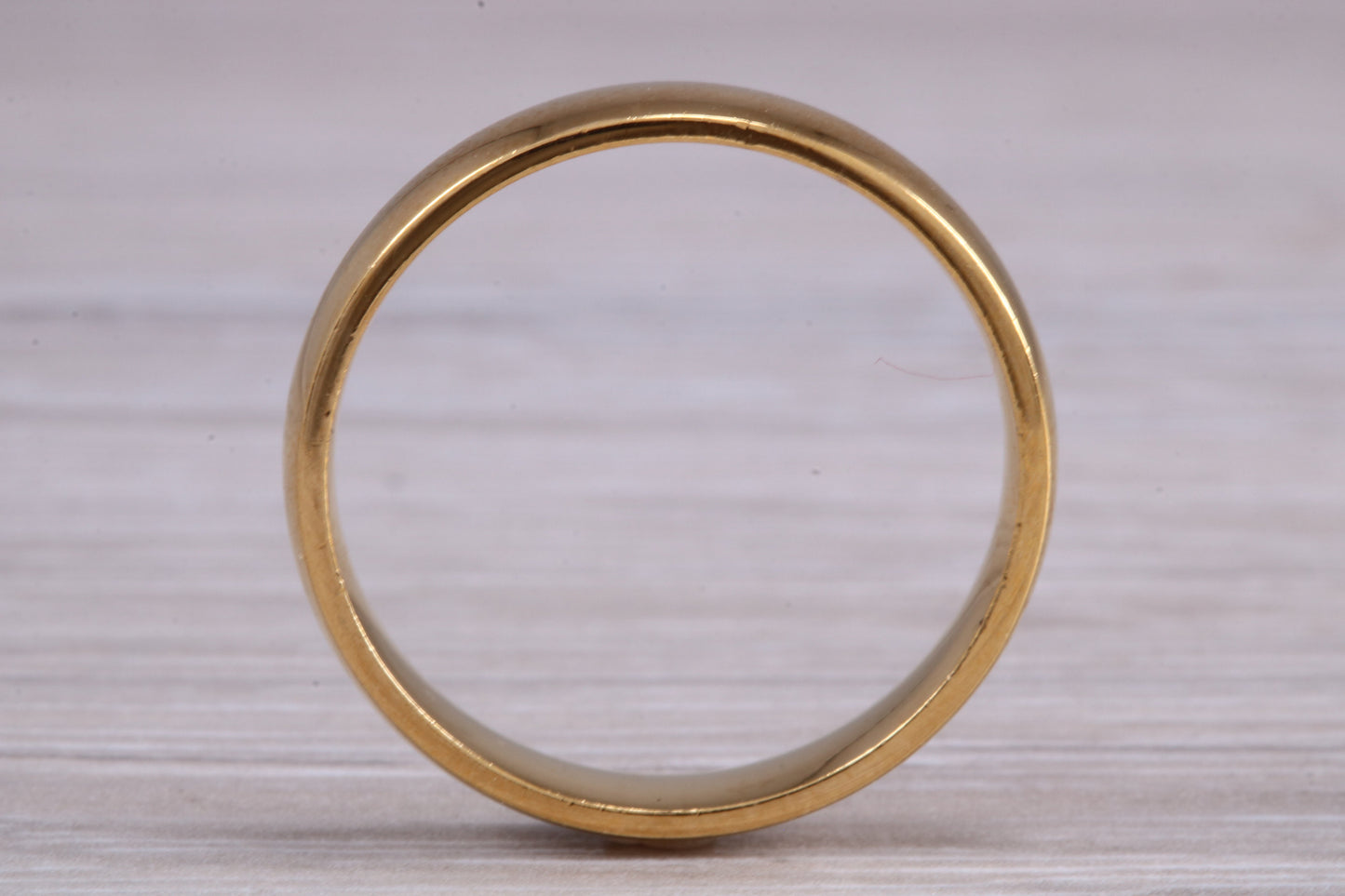 5 mm court profile Silver band with 18ct yellow Gold hard plating, looks just like a gold band for a fraction of the cost