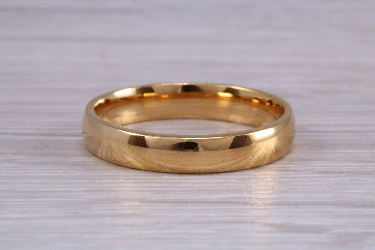 4 mm court profile Silver band with 18ct yellow Gold hard plating, looks just like a gold band for a fraction of the cost