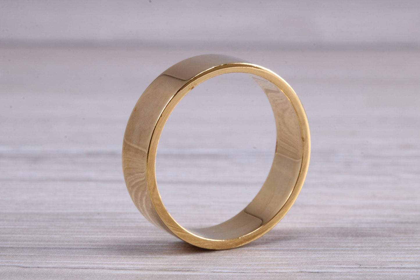 6 mm flat profile Silver band with 18ct yellow Gold hard plating, looks just like a gold band for a fraction of the cost