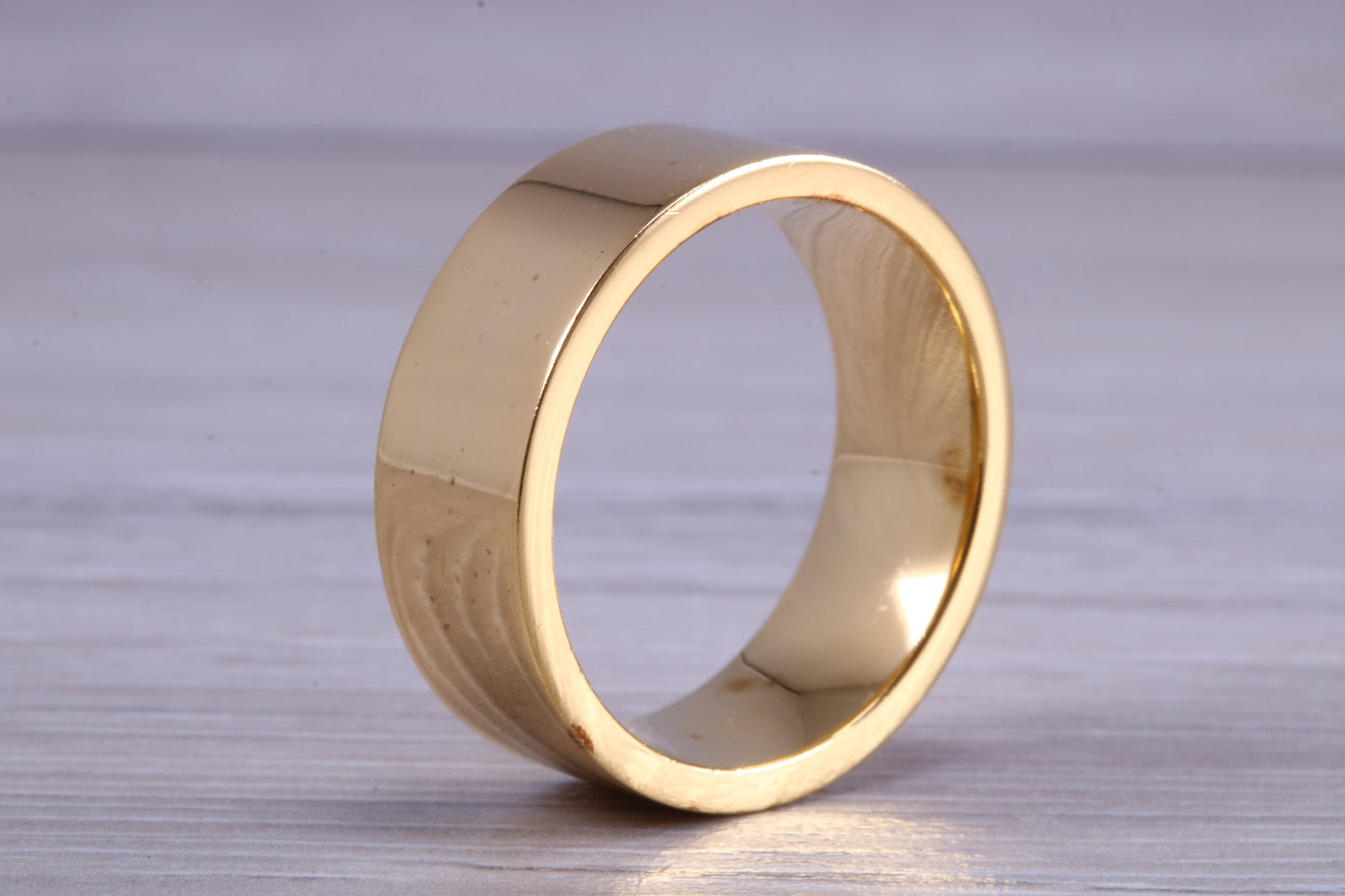 10 mm flat profile Silver band with 18ct yellow Gold hard plating, looks just like a gold band for a fraction of the cost. Very wide band