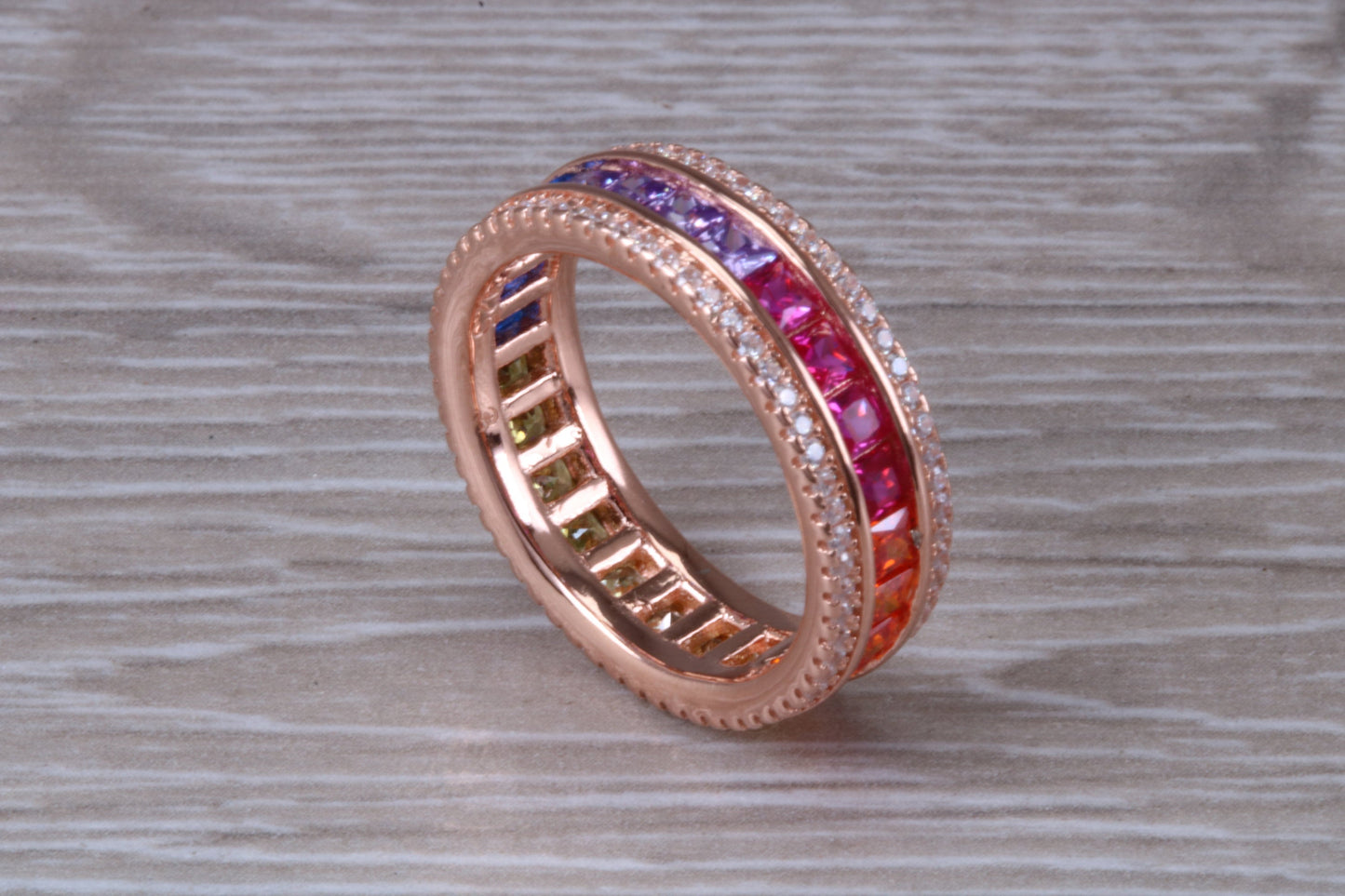 Beautiful fully set rainbow ring, set with top grade multi coloured C Z and 18ct rose gold plated, absolutely stunning ring