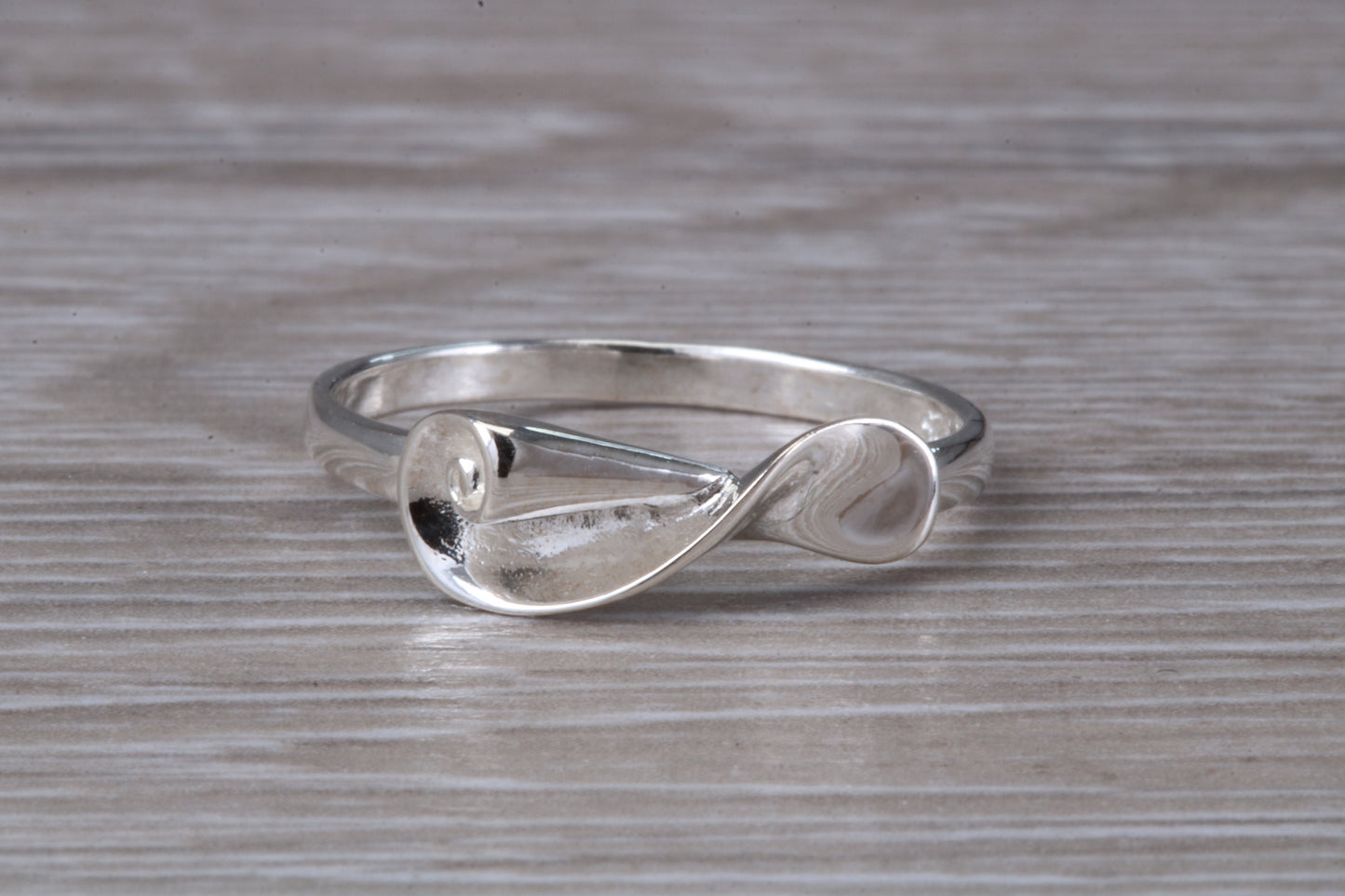 Scroll design ring, solid silver with high polished finish, very dainty and suitable for all ages