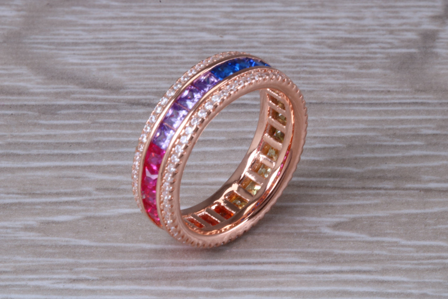 Beautiful fully set rainbow ring, set with top grade multi coloured C Z and 18ct rose gold plated, absolutely stunning ring