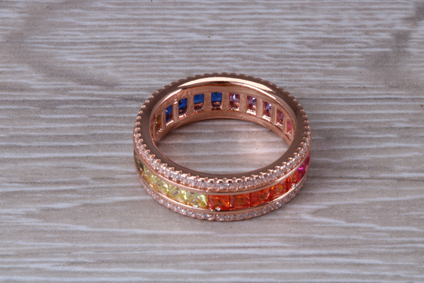 Beautiful fully set rainbow ring, set with top grade multi coloured C Z and 18ct rose gold plated, absolutely stunning ring
