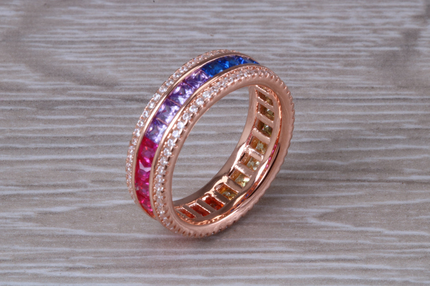 Beautiful fully set rainbow ring, set with top grade multi coloured C Z and 18ct rose gold plated, absolutely stunning ring