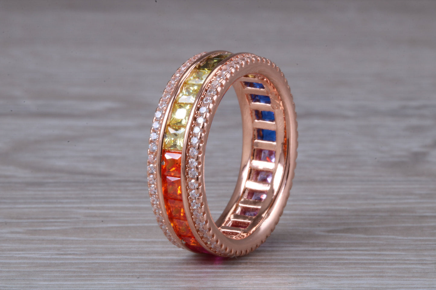 Beautiful fully set rainbow ring, set with top grade multi coloured C Z and 18ct rose gold plated, absolutely stunning ring