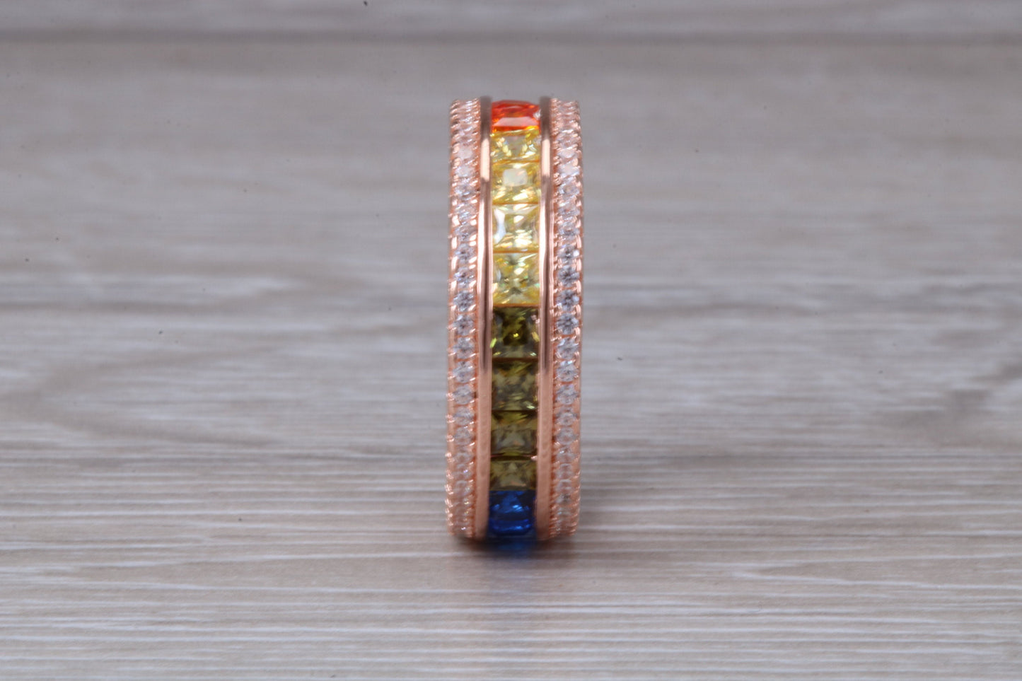 Beautiful fully set rainbow ring, set with top grade multi coloured C Z and 18ct rose gold plated, absolutely stunning ring