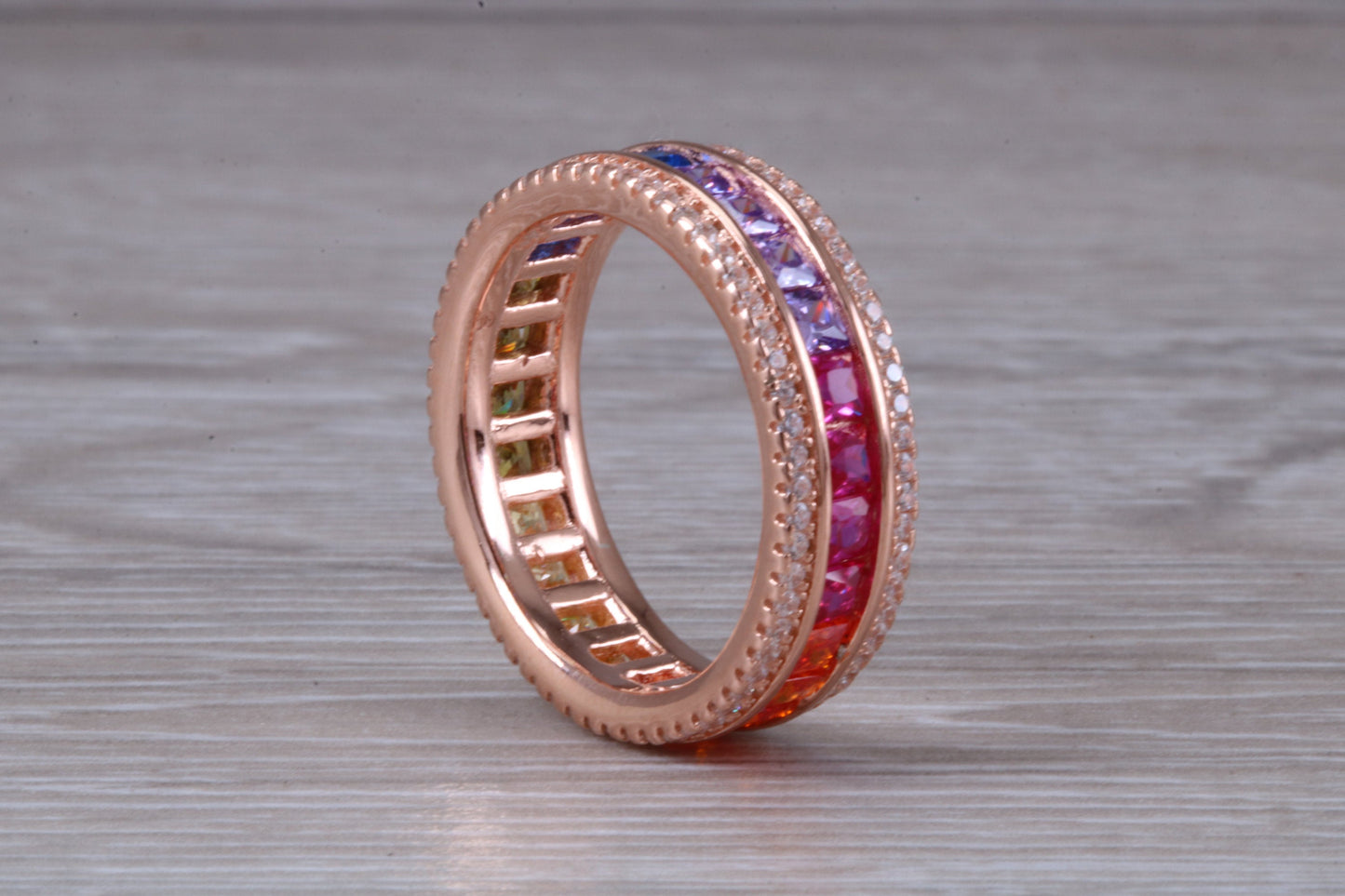 Beautiful fully set rainbow ring, set with top grade multi coloured C Z and 18ct rose gold plated, absolutely stunning ring