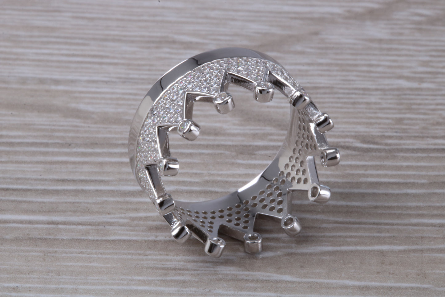 Crown ring, C Z set in solid sterling silver and further rhodium plated for that platinum look