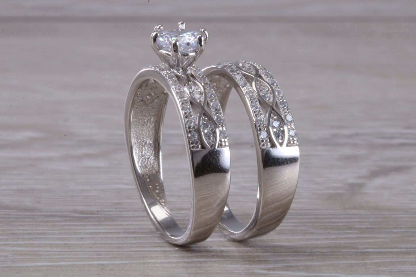 Diamond look Bridal rings set, C Z set in sterling silver and further rhodium plated for that platinum look, engagement and wedding ring set