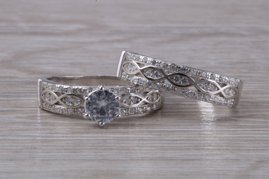 Diamond look Bridal rings set, C Z set in sterling silver and further rhodium plated for that platinum look, engagement and wedding ring set