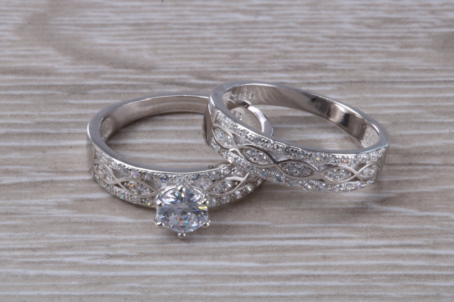 Diamond look Bridal rings set, C Z set in sterling silver and further rhodium plated for that platinum look, engagement and wedding ring set