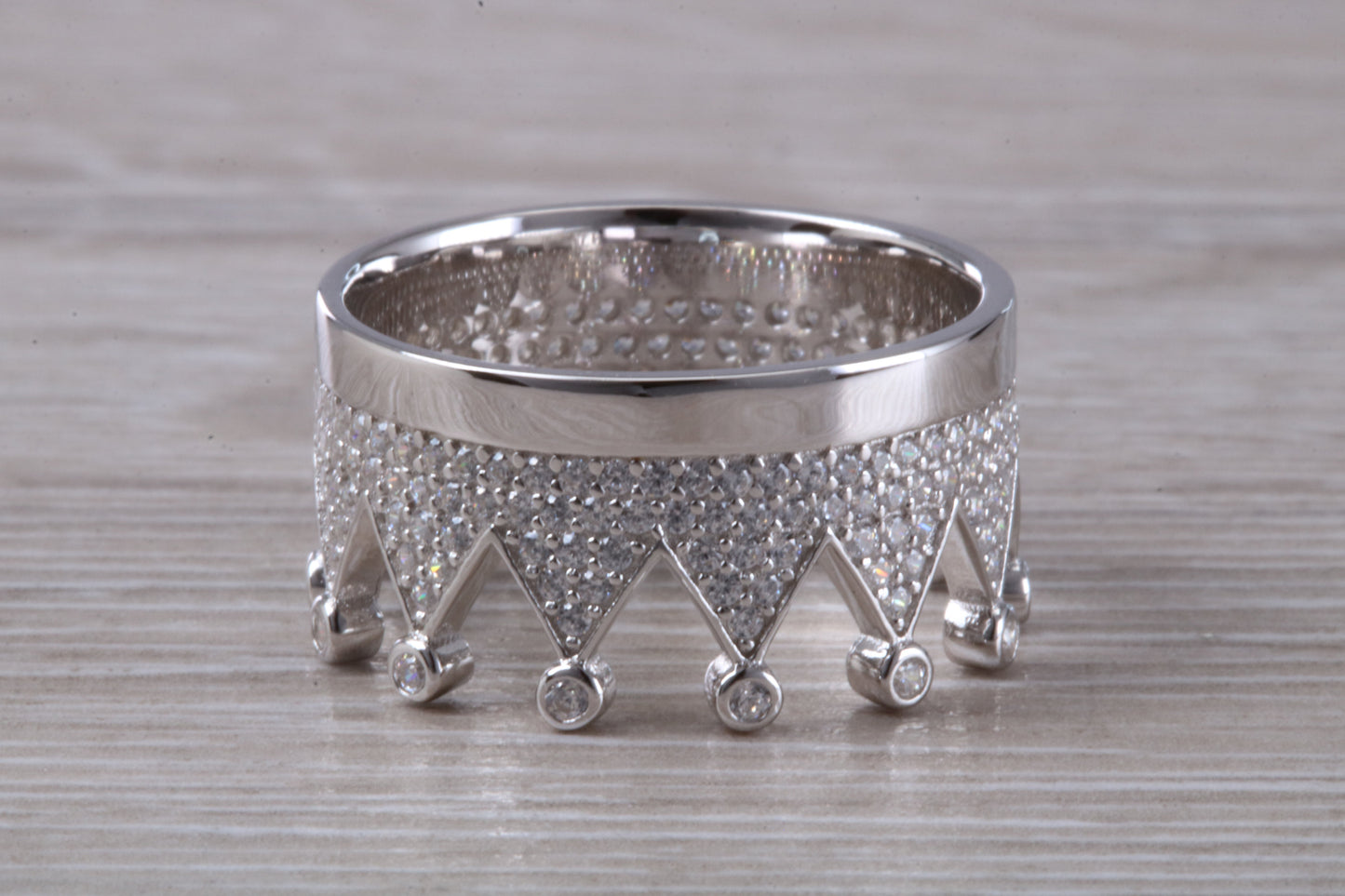 Crown ring, C Z set in solid sterling silver and further rhodium plated for that platinum look