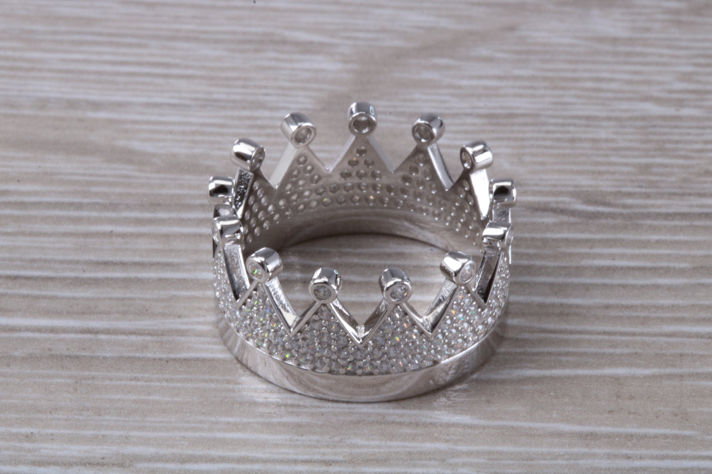 Crown ring, C Z set in solid sterling silver and further rhodium plated for that platinum look