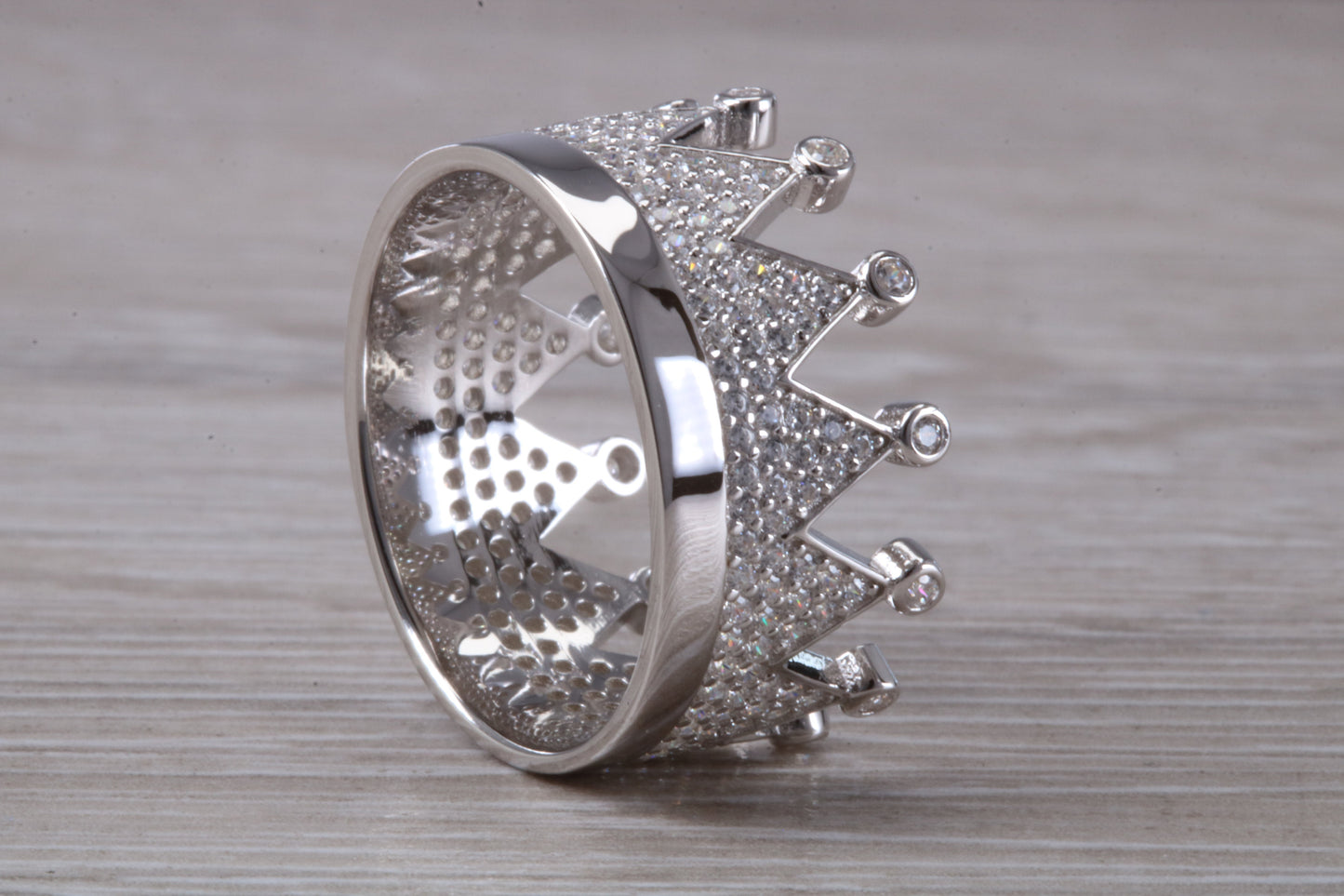 Crown ring, C Z set in solid sterling silver and further rhodium plated for that platinum look