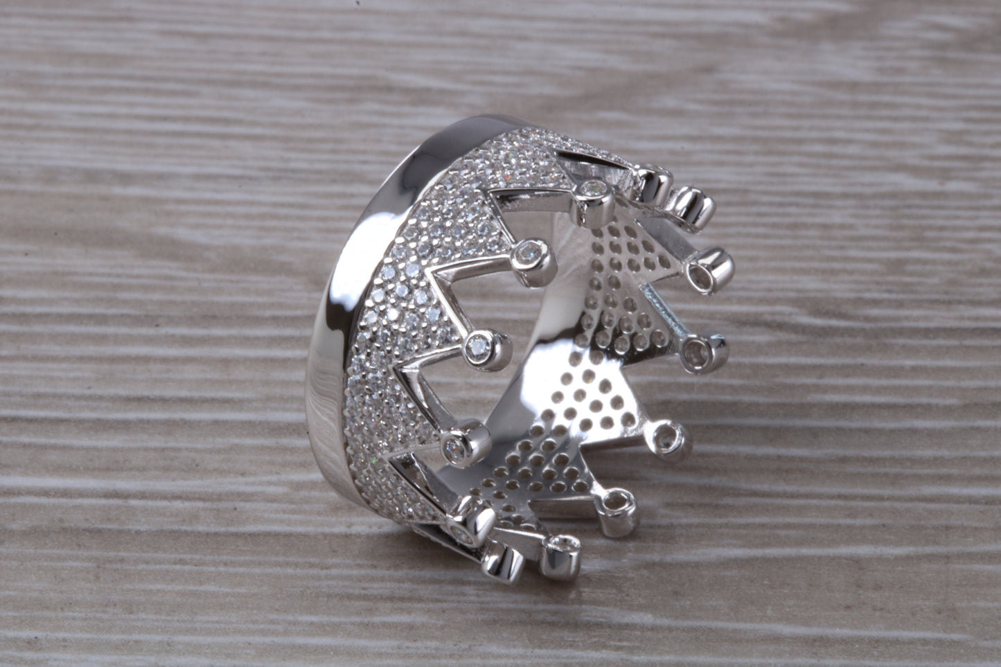 Crown ring, C Z set in solid sterling silver and further rhodium plated for that platinum look