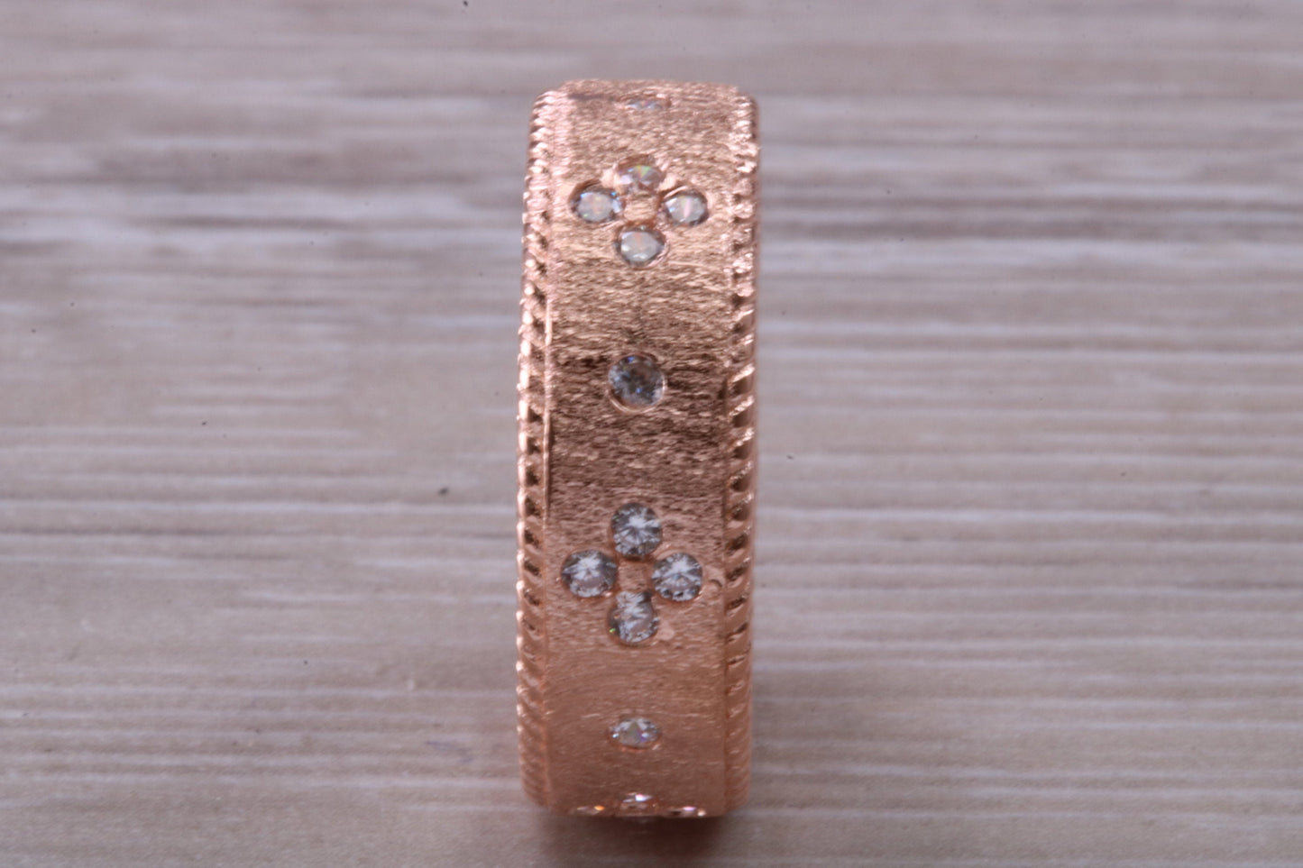 Sterling Silver Rose Gold 7 mm wide band, 18ct Rose Gold plated and set with Diamond White C Z
